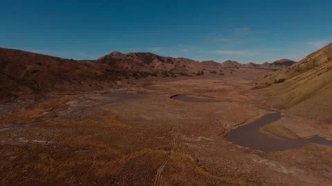 Chasing sunrise over the iconic Mount Bromo Stock Footage 304221463
