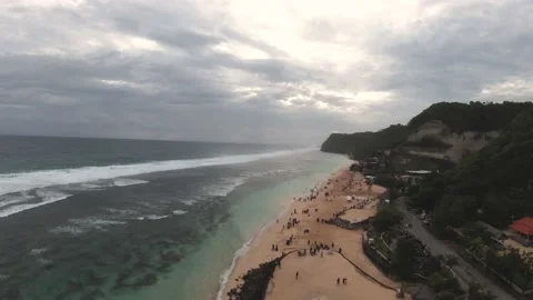 Chasing the Sunset over the sea and white sand that surrounded by Beach Club 動画素材 237873374