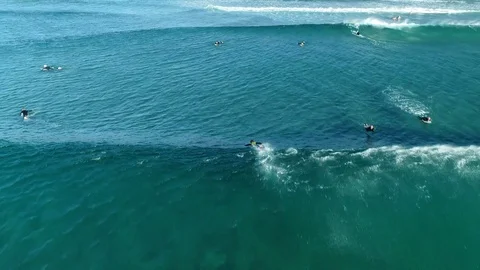 Chasing a surfer from behind the wave with offshore breeze 4K, NSW Stock Footage 102086711