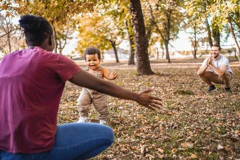 Chasing Toddler Fun in the Fall Foto stock