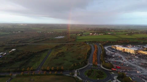 Chasing a very close rainbow with a drone, 4k Stock Footage 252077289