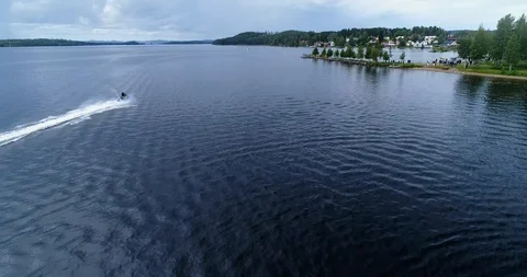 Chasing a water scooter during a summer event and fair Stock Footage 123174796