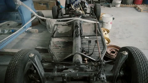 Chassis of the car in the garage Stock Footage 86335729