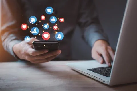 Chat and notification on smartphone with virtual red heart and blue like em.. Foto stock