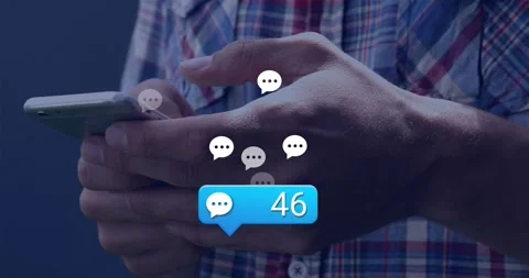 Chat bubble appearing causing hands tapping, scrolling phone screen as bubbles Stock Footage 317459663