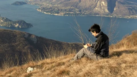 Chat with friends and send him a photo of the landscape Stock Footage 59710681