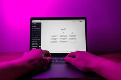 Chat GPT on computer. Man working on PC with Chat GPT. Point of view shot Stock Photos