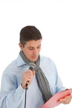 Chat show host or organiser using a microphone Stock Photos