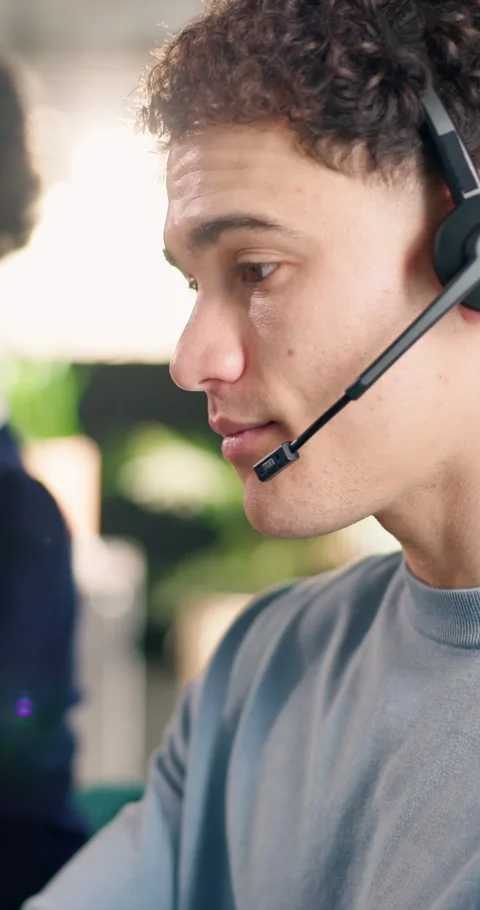 Chat, support and man with headset in agency for customer service or online Stock Footage 340602127