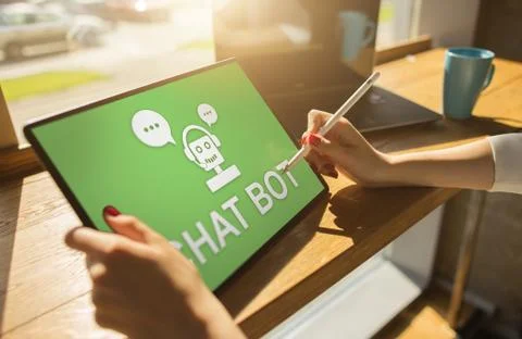 Chatbot icon on device screen. Customer Support automation concept. Stock Photos