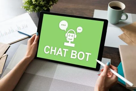 Chatbot icon on device screen. Customer Support automation concept. Фото