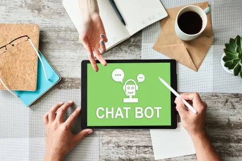 Chatbot icon on device screen. Customer Support automation concept. Stock Photos