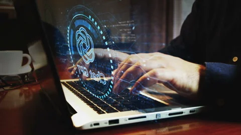 ChatGPT artificial intelligence chat bot symbol and man typing keyboard Stock Footage 243811215