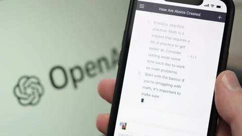 ChatGPT Chat Bot Screen On Smartphone With Logo In Background Stock Footage 229515344