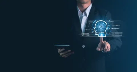 ChatGPT chatting with artificial intelligence or AI. Businessman hand hold .. Stock Photos