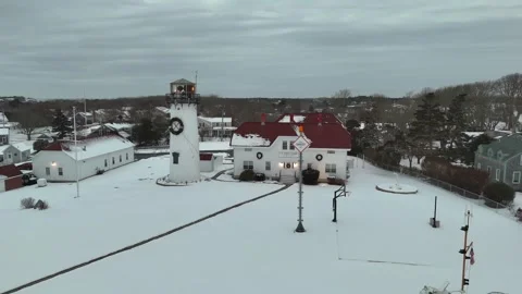 Chatham, Cape Cod Lighthouse in Winter with Snow Aerial Stock Footage 325748533