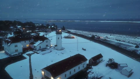 Chatham, Cape Cod Lighthouse in Winter with Snow Aerial Stock Footage 325748593