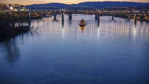 Chattanooga Time lapse River boat coming across tennessee river under the bridge Stock Footage