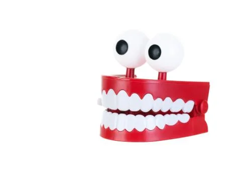 Chattering teeth on a pure white background Stock Photos