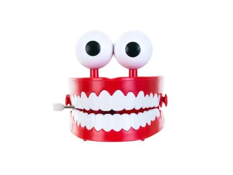 Chattering teeth on a pure white background Stock Photos