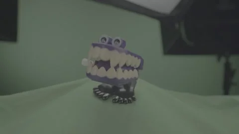 Chattering Teeth Purple | Green Screen | Eye Level Video stock 246076078