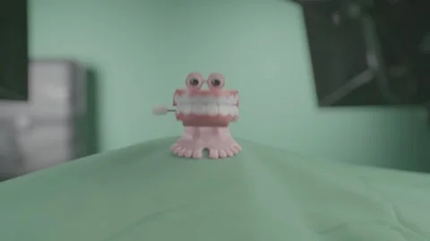 Chattering Teeth Red | Straight On | Slowmo Video stock 246076105