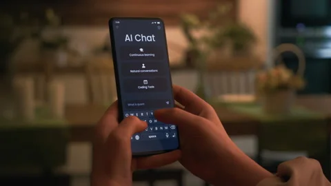 Chatting with artificial intelligence online. Writing prompt and asking GPT Stock Footage 274929711