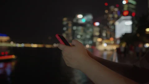 Chatting with friend during night outing in the city Stock Footage 135836248
