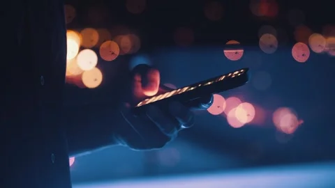 Chatting on phone about work late at night. Businessman using smartphone at Stock Footage 312748826