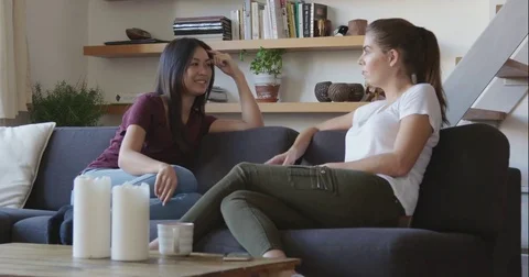 Chatting On Sofa Wide2 Stock Footage 82652647