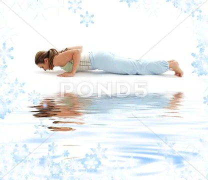 Chaturanga dandasana four-limbed staff pose on white sand: Royalty Free ...