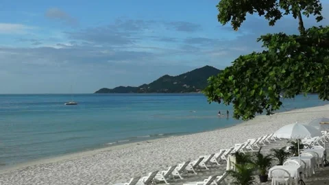 Chaweng beach with umbrella Stock Footage 133324110