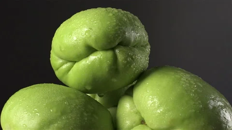 Chayote isolated rotating on black/gray background Stock Footage 62389753