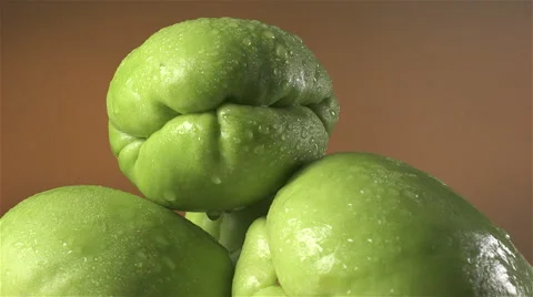 Chayote isolated rotating on brown/gray background Stock Footage 62390387