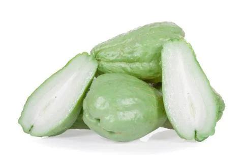Chayotes isolated on white background, with one Chayote cut in half showing t Stock Photos