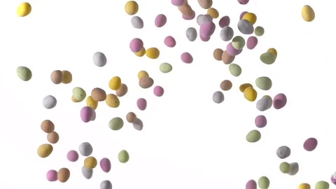 Chcolate mini eggs flying in air Stock Footage 270801946