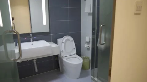 Cheap hotel toilets Stock Footage 156804154