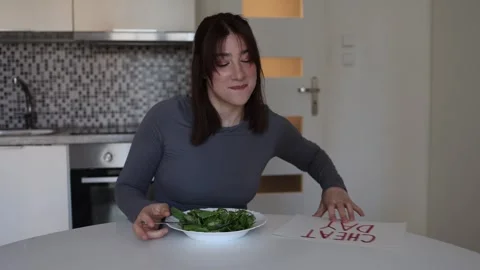Cheat day after strict dieting Stock Footage 334575981