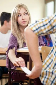 Cheating on test with cheat sheet Stock Photos