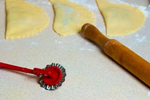 Cheburek lying on the table before frying Stock Photos