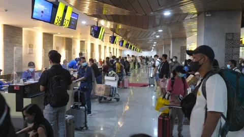 Check-in on board procedure during corona virus pandemic at the airport. Bali Stock Footage 156191152