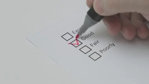 Check box Good red pen on white paper Stock Footage 295037590