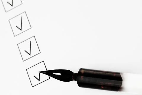 Check boxes and pen Foto stock