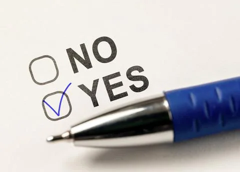Check boxes yes or no on white paper. checkbox YES. marked with tick mark and Stock Photos