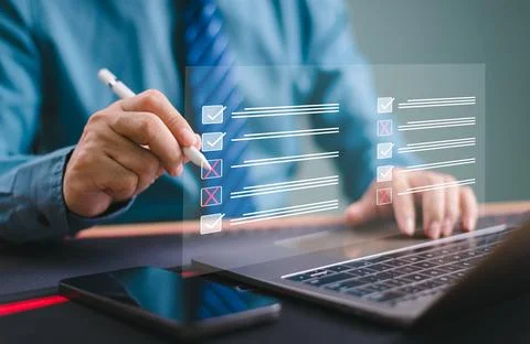 Check business checklist performance concept. Businessman use computer laptop Stock Photos