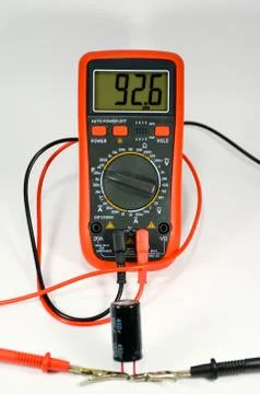 Check the capacitor with a multimeter. Stock-Fotos