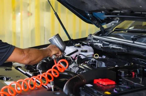 Check to clean the car. Stock Photos