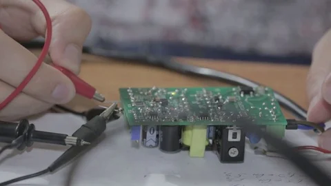 Check Electronic Circuit On Board With Multimeter Stock Footage 78974595