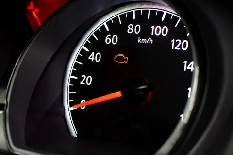 Check Engine Light Close Up on car dashboard Stock Photos