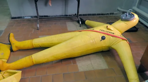 Check for leaks protective suit (2) Video stock 49071897